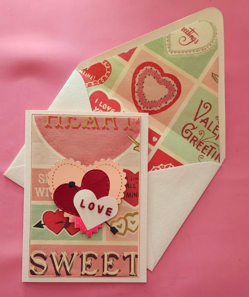 Handmade Valentine's Day card with lined envelope.