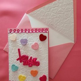 Handmade Valentine's Day card with lined embossed envelope.