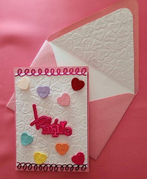 Handmade Valentine's Day card with lined embossed envelope.